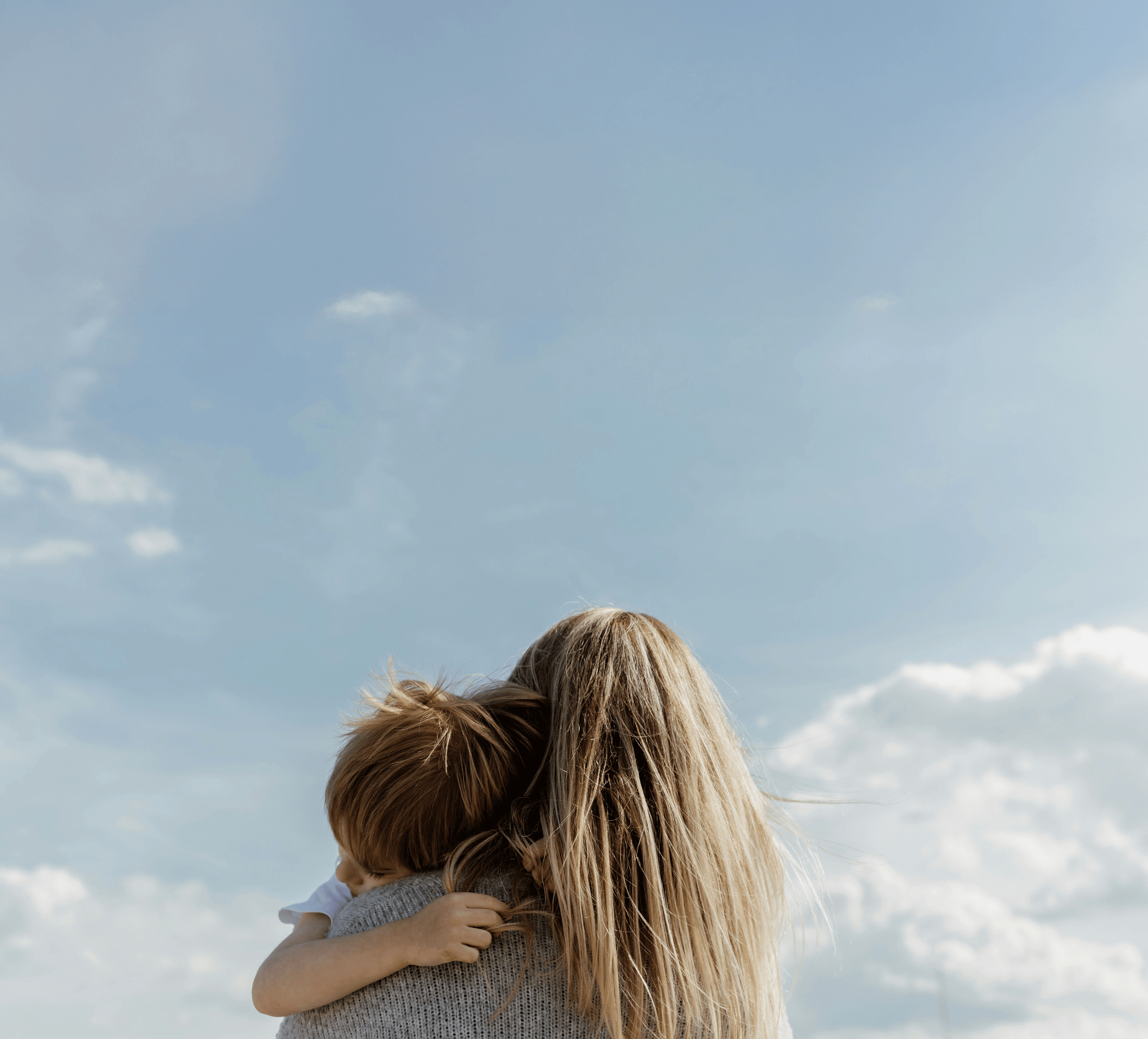 Photo of a mother holding her child